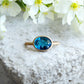 Anello con topazio London Blue