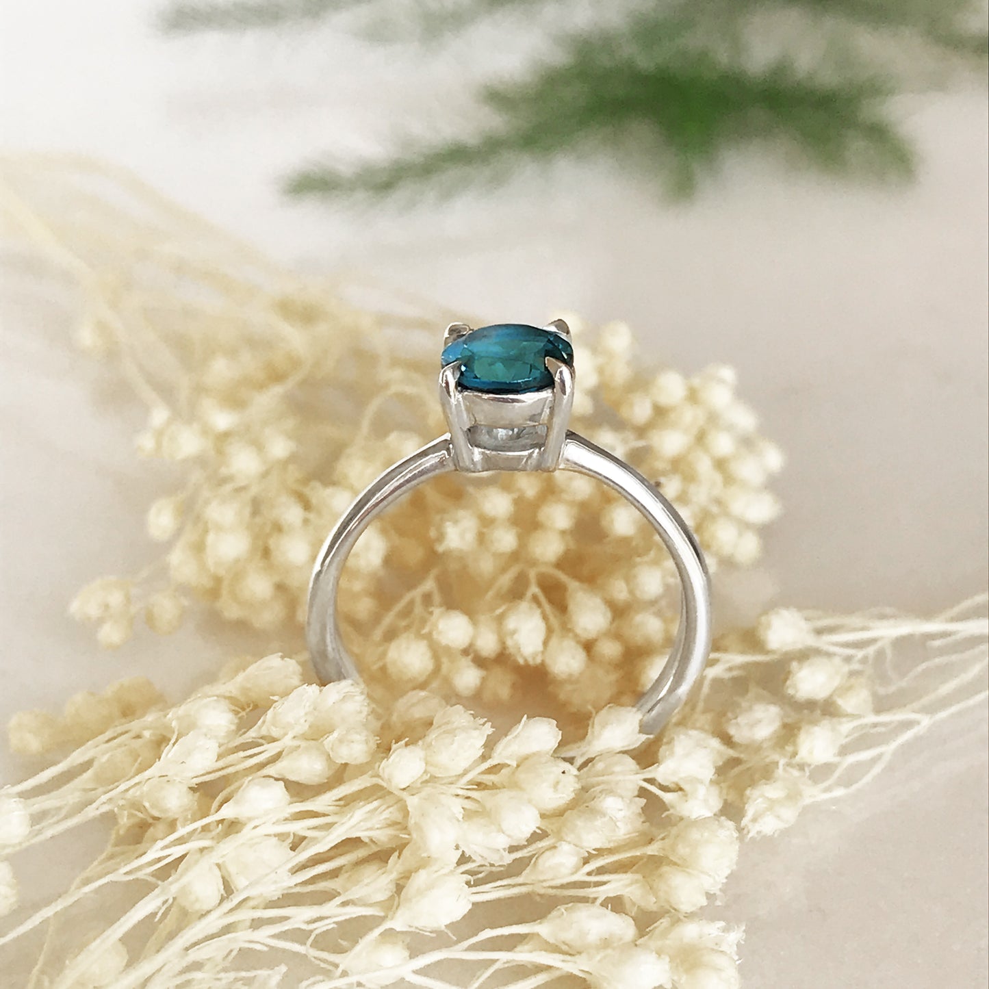 Solitario con Topazio London Blue